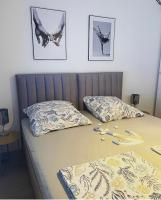 Postel nebo postele na pokoji v ubytování Apartment Mala Medulin