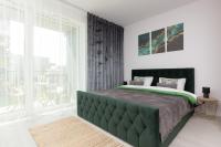 Posteľ alebo postele v izbe v ubytovaní Cozy Studio Żupnicza Soho Factory by Noclegi Renters