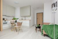 Kuchyňa alebo kuchynka v ubytovaní Cozy Studio Żupnicza Soho Factory by Noclegi Renters