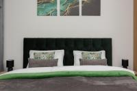 Posteľ alebo postele v izbe v ubytovaní Cozy Studio Żupnicza Soho Factory by Noclegi Renters