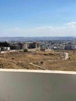 Nespecifikovaný výhled na destinaci Tunis nebo výhled na město při pohledu z apartmánu