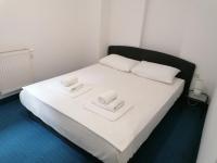Posteľ alebo postele v izbe v ubytovaní Hotel Garny Pleso