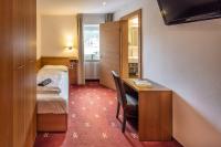 Posteľ alebo postele v izbe v ubytovaní Hotel Sella***s