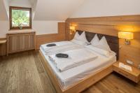 Posteľ alebo postele v izbe v ubytovaní Hotel Sella***s