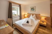 Posteľ alebo postele v izbe v ubytovaní Hotel Sella***s
