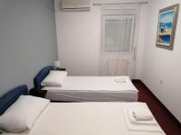 Posteľ alebo postele v izbe v ubytovaní Hotel Garny Pleso