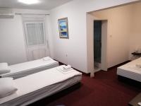 Posteľ alebo postele v izbe v ubytovaní Hotel Garny Pleso