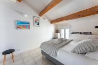 Posteľ alebo postele v izbe v ubytovaní A LA CALANQUE - Jolie Maison en bord de mer