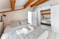 Posteľ alebo postele v izbe v ubytovaní A LA CALANQUE - Jolie Maison en bord de mer