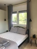 Posteľ alebo postele v izbe v ubytovaní georgia's cozy rooms #3