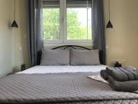Posteľ alebo postele v izbe v ubytovaní georgia's cozy rooms #3