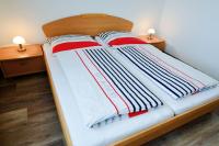 Postel nebo postele na pokoji v ubytování Haus Nordseebrandung NB26
