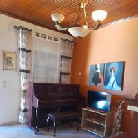 A television and/or entertainment centre at Niki House