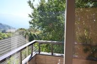 a balcony with a view of a mountain at Dreamtown in Ren&#39;ai