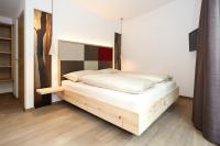Posteľ alebo postele v izbe v ubytovaní Hotel Gasthof Höllriegl