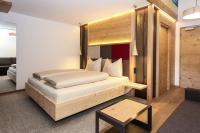 Posteľ alebo postele v izbe v ubytovaní Hotel Gasthof Höllriegl