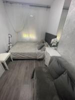Łóżko lub łóżka w pokoju w obiekcie LUXURY room en MADRID