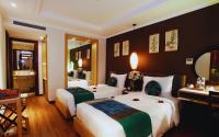 Hotel Emerald Waters Classyにあるベッド