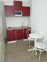 A kitchen or kitchenette at Berenice Suite