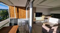 TV a/nebo společenská místnost v ubytování Apartment No. 29 - Riviéra Lipno nad Vltavou 511