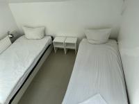 Posteľ alebo postele v izbe v ubytovaní Hoża Apartments and Rooms