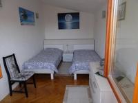 Posteľ alebo postele v izbe v ubytovaní Apartment Elite