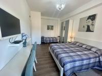 A bed or beds in a room at Dreamsrome Lux