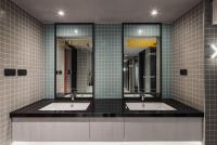 a bathroom with three sinks and three mirrors at OLAH Poshtel - Taichung Station in Taichung
