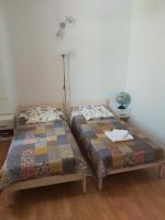 Postel nebo postele na pokoji v ubytování Apartman Brina