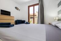 A bed or beds in a room at Gmar House relax y naturaleza