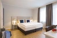Koopmanns Hotel und Lädchenにあるベッド
