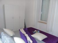 Posteľ alebo postele v izbe v ubytovaní Apartman Vale