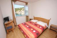 Posteľ alebo postele v izbe v ubytovaní Apartments and rooms by the sea Zaglav, Dugi otok - 8144
