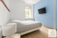 Televízia a/alebo spoločenská miestnosť v ubytovaní Residence Poterne