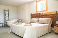 Posteľ alebo postele v izbe v ubytovaní Tre Cercole - Eco Resort