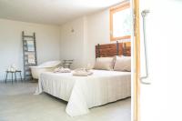 Posteľ alebo postele v izbe v ubytovaní Tre Cercole - Eco Resort