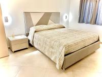 Posteľ alebo postele v izbe v ubytovaní Imperial Rooms Tropea