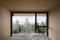 Posteľ alebo postele v izbe v ubytovaní anders mountain suites 5