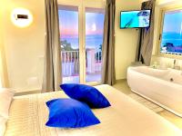Posteľ alebo postele v izbe v ubytovaní Imperial Rooms Tropea
