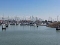 a group of boats docked in a harbor at Appartement Blankenberge Zeedijk aan de Pier in Blankenberge