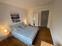 Posteľ alebo postele v izbe v ubytovaní Fabuleux T3 de 85 m2, situé au calme avec grand parking gratuit privé ,Fibre wifi