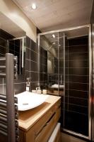 a bathroom with a sink and a large mirror at Very Nice Studio Ideal For 2 Near The Halles in Avignon