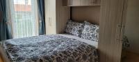 Cama ou camas em um quarto em La Perla