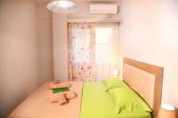 Posteľ alebo postele v izbe v ubytovaní Sarti View House