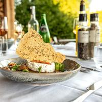 a plate of food sitting on a table at MAISON de la Bonne Vie in Thérondels