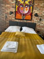 Apartament Rzekotka Zielona Dereniowa 60にあるベッド