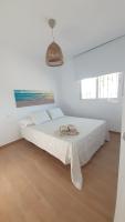Posteľ alebo postele v izbe v ubytovaní Apartamento Alegría