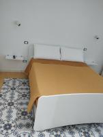 Posteľ alebo postele v izbe v ubytovaní La Bomboniera B&B Amalfi coast