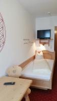Łóżko lub łóżka w pokoju w obiekcie Das Wismeyer - Skihotel an der Plattenkarbahn