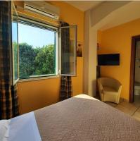 Posteľ alebo postele v izbe v ubytovaní Hotel Sirio